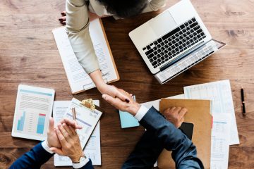 business-people-shaking-hands-together