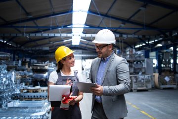manager-supervisor-and-worker-discussing-about-production-results-and-new-strategy-in-factory-industrial-hall