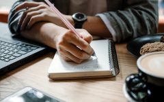 To do list, organize plans, projects, checklist, Productivity Works. Woman writing to do list. Close up of female hand writing check note in notebook. Selective focus